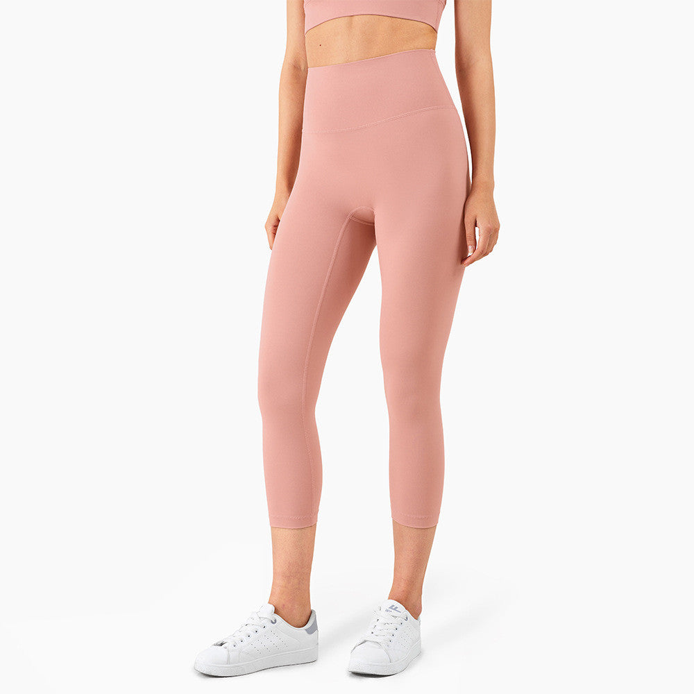 Peach Hips Fitness cropped leggings by Alvionz.com featuring a snug fit and peachy tone, ideal for workout and active wear.