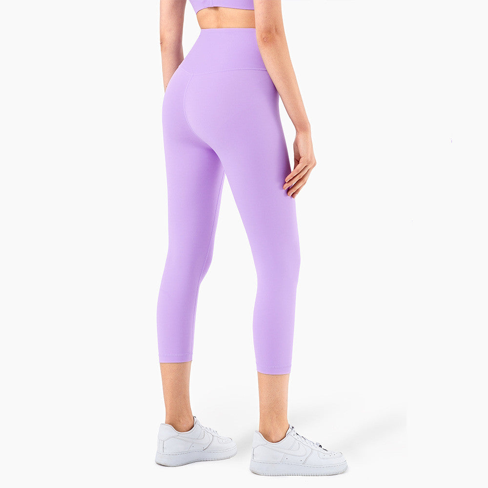 Peach Hips Fitness Cropped Leggings by Alvionz.com showing a close-up of the peach-colored athletic leggings with a fitted design.