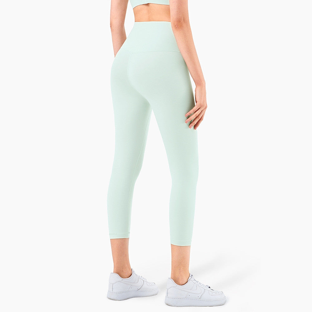 Peach Hips Fitness Cropped Leggings by Alvionz.com, showing the peach-colored athletic leggings with a high waist and cropped length.