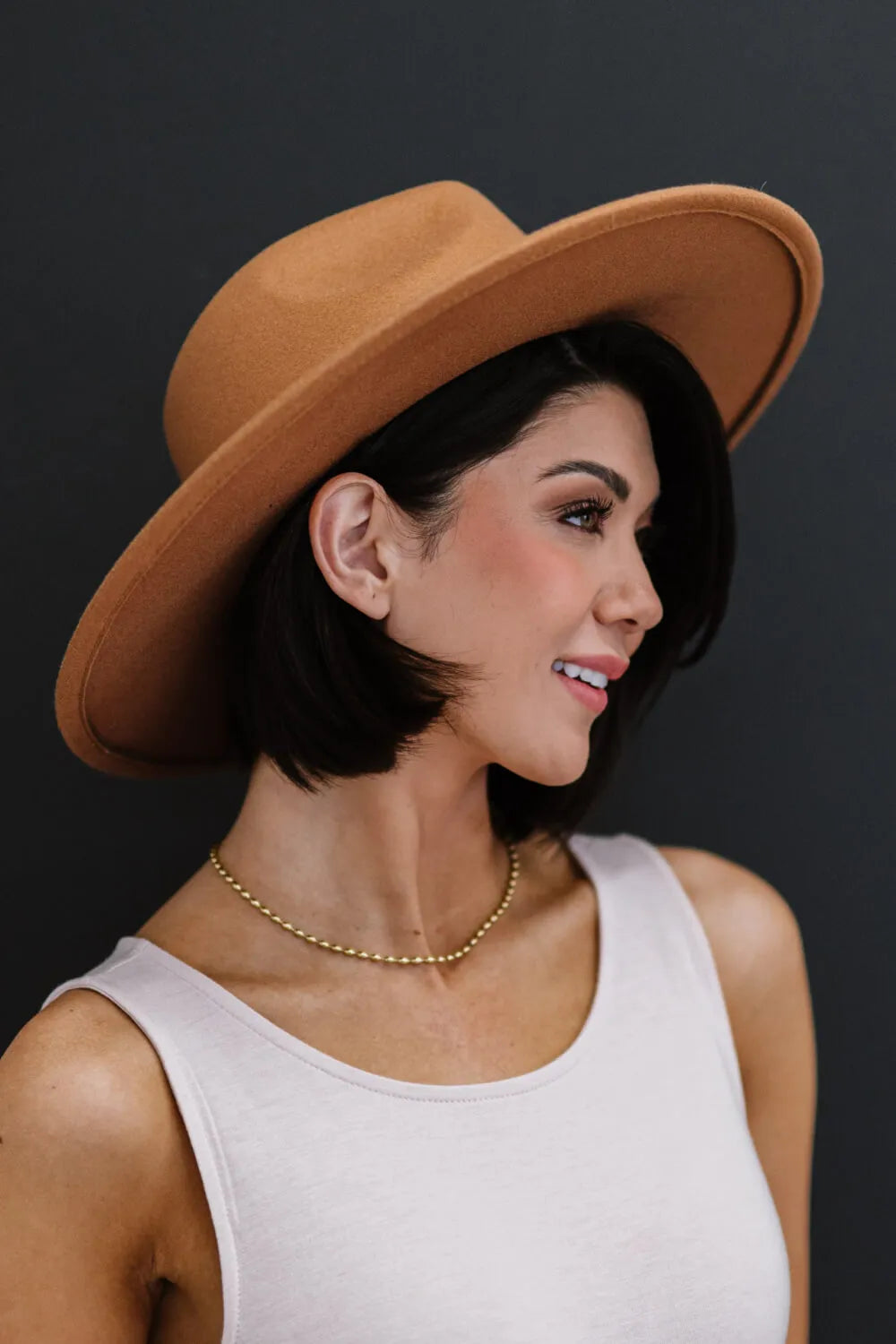 Fame You Got It Fedora hat by Trendsi, stylish wide-brim fedora in neutral color with a pinched crown and decorative band.