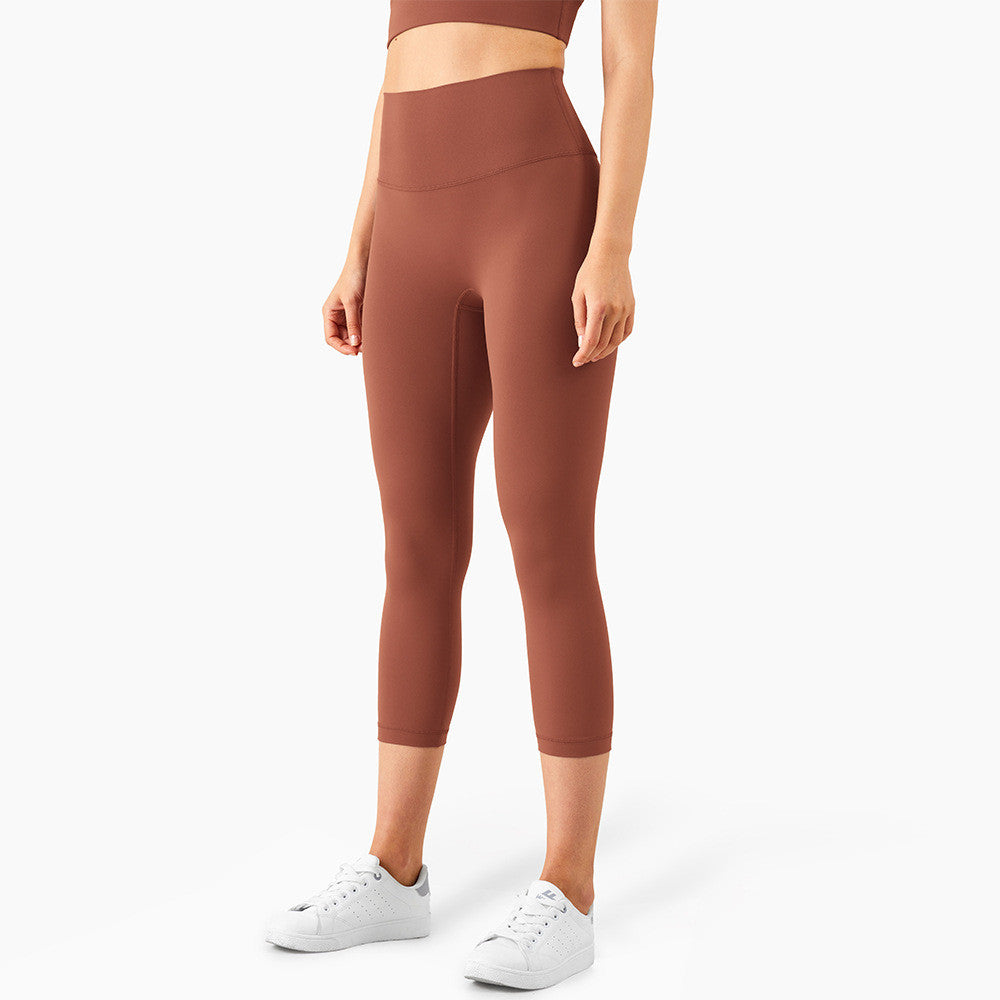 Peach Hips Fitness Cropped Leggings by Alvionz.com, showing a close-up of peach-toned, high-waisted cropped leggings with a smooth fit.