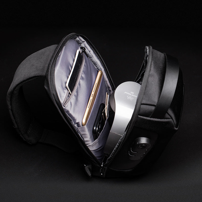 Army green men's chest bag by Agate, anti-theft messenger shoulder bag with multiple compartments for secure carrying.