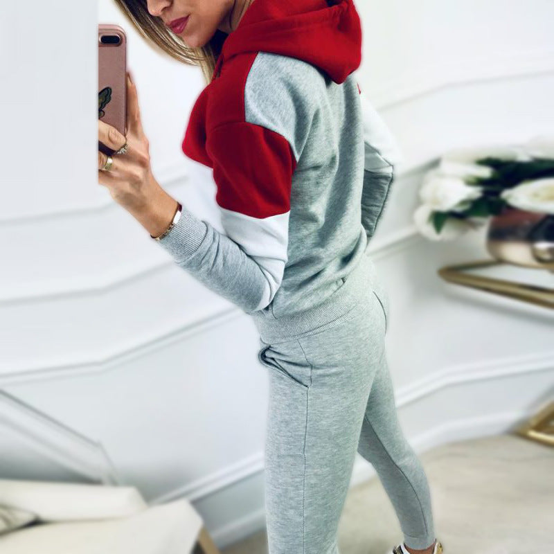 Black women's sportswear tracksuit by Agate featuring an autumn hooded casual suit with a relaxed fit and comfortable design.