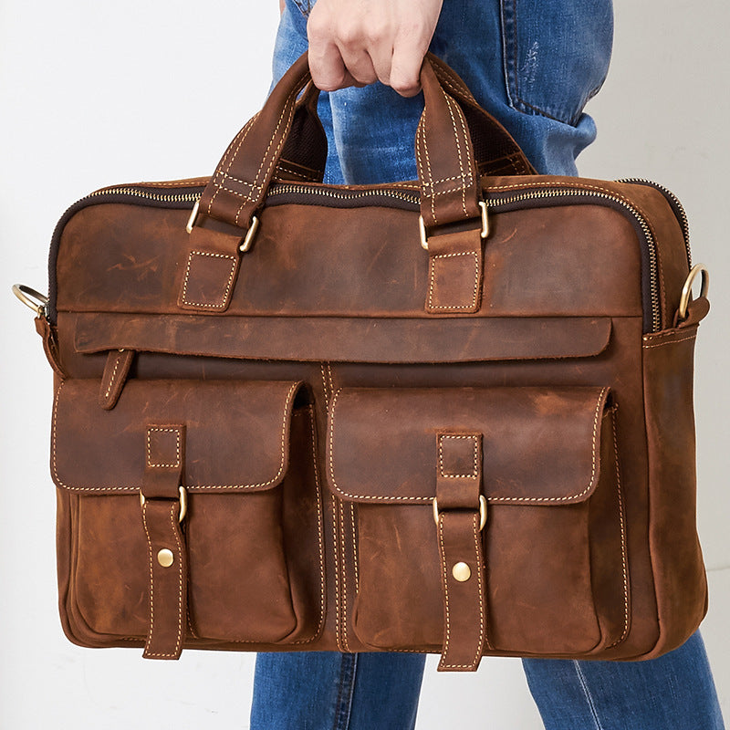 Black genuine men's retro business bag by Agate, featuring a classic design and durable leather finish.