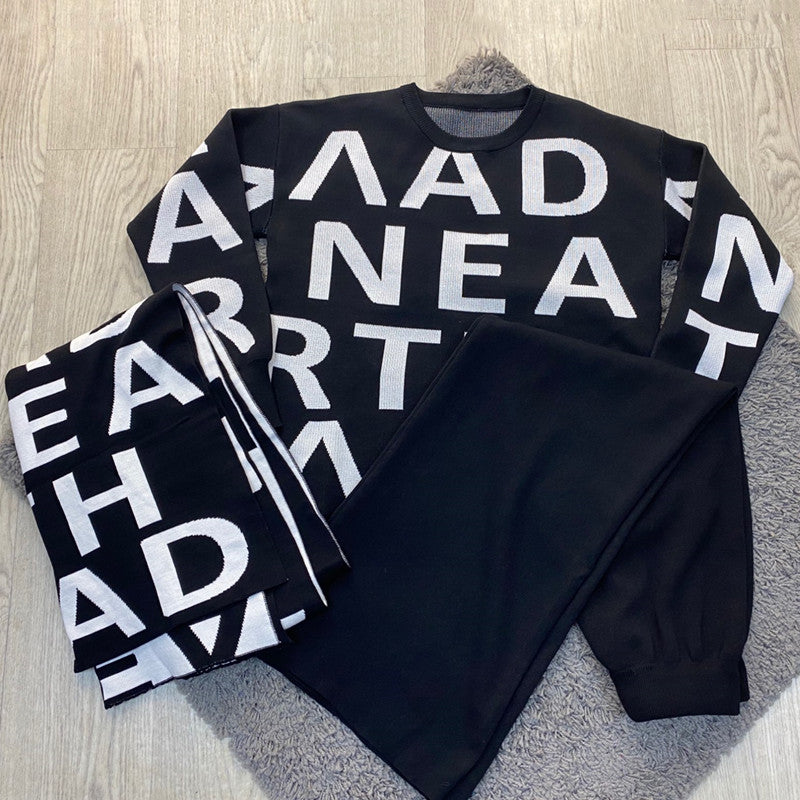 Black women's sport winter suit featuring a cozy sweater from Agate, ideal for cold weather outdoor activities.