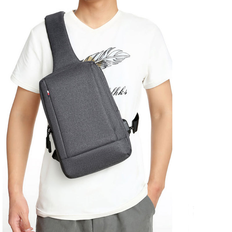 Black Agate men's chest bag and crossbody sling backpack with adjustable shoulder strap and multiple compartments.