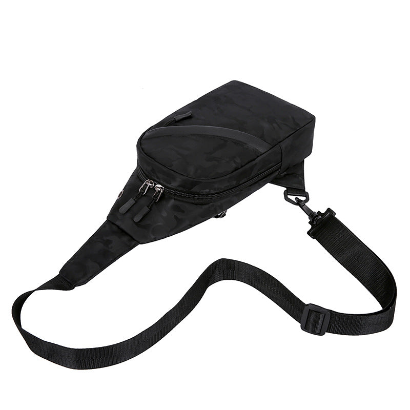 Black camouflage men's chest bag by Agate with crossbody strap and headphone hole for convenient listening.