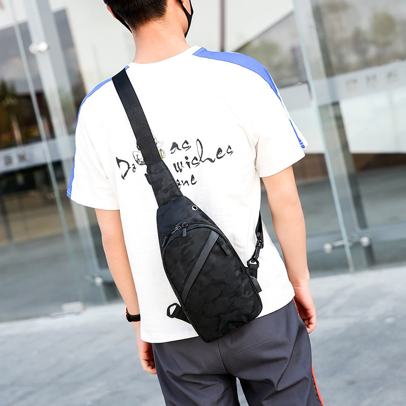 Black camouflage chest bag for men by Agate, crossbody style with a headphone hole for convenient listening.