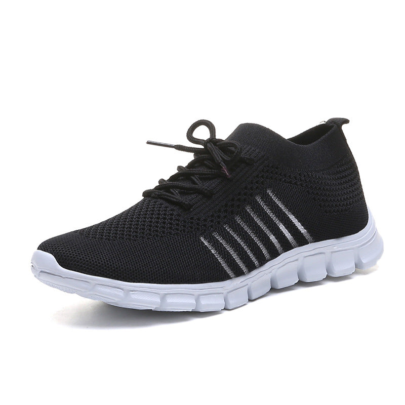 Beige breathable casual women's flying knit sports shoes by Agate, featuring flat sole and comfortable design.