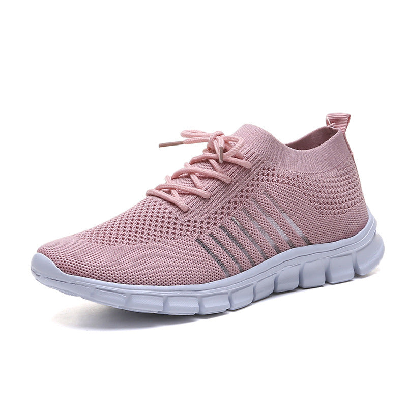 Beige breathable casual women's shoes by Agate featuring flying knit design and flat sole for comfortable everyday wear.