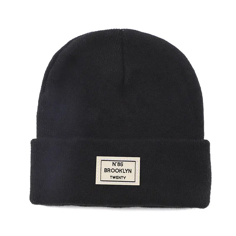 Knitted Beanie With Brand Label Stylish And Fashionable - Alvionz.de