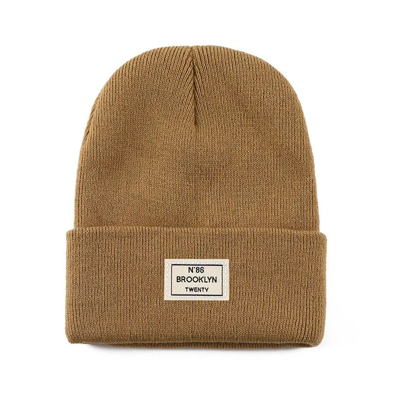 Knitted Beanie With Brand Label Stylish And Fashionable - Alvionz.de