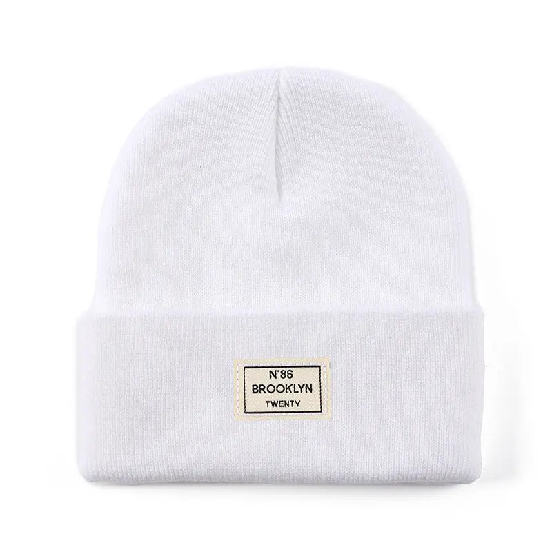 Knitted Beanie With Brand Label Stylish And Fashionable - Alvionz.de