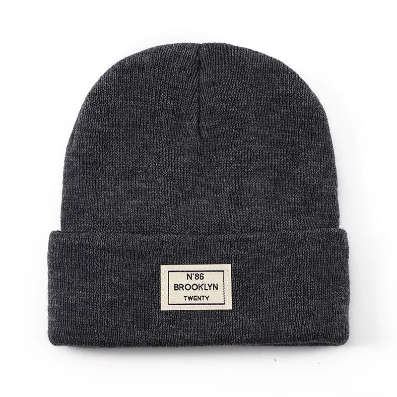 Knitted Beanie With Brand Label Stylish And Fashionable - Alvionz.de
