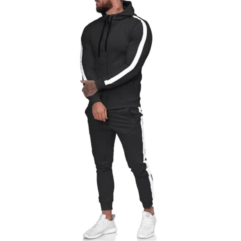 Black and white men's athletic tracksuit set with hood and zip-up front by Alvionz.de, size 3XL, suitable for sports and casual wear.