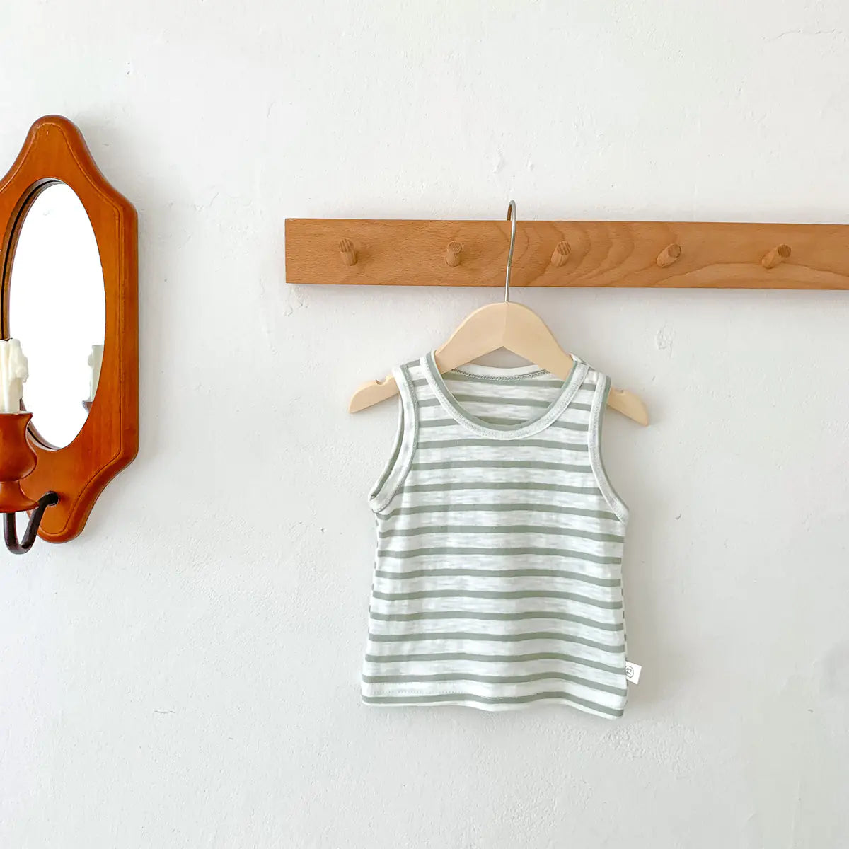 Red baby striped sleeveless vest for toddlers and infants by Alvionz.de, showing soft fabric and comfortable fit