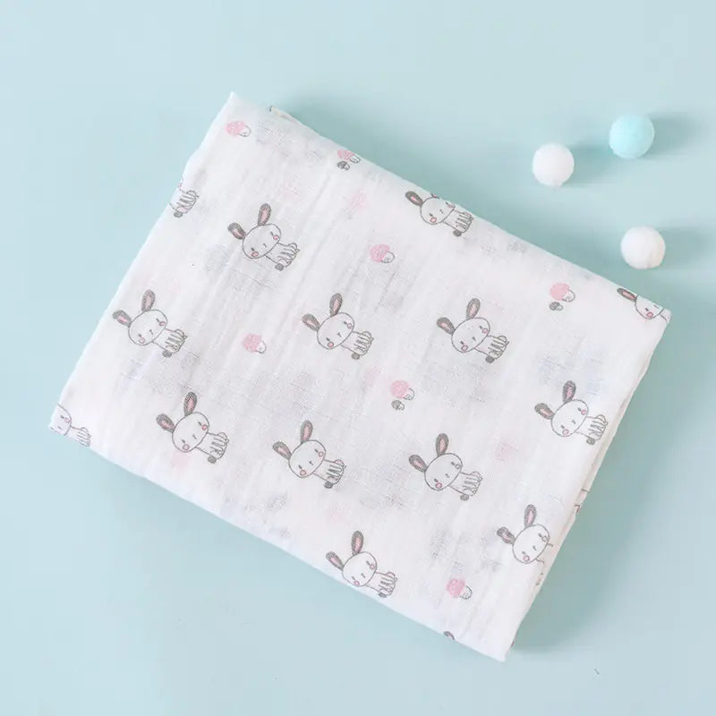 Soft cotton double-layer cartoon baby blanket featuring a playful fox design, perfect for infants and toddlers.