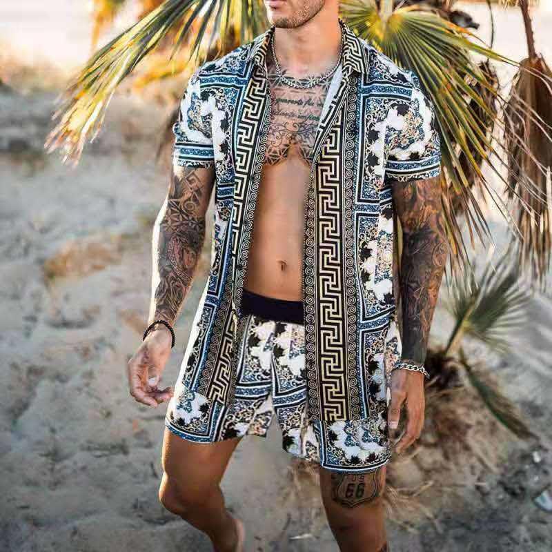 Light blue and white printed men's Hawaiian set by Agate, featuring a breathable short-sleeve shirt and matching shorts for summer.