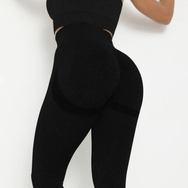 Alvionz moisture-wicking fitness leggings in black, showing a close-up of stretchy, breathable fabric designed for active wear