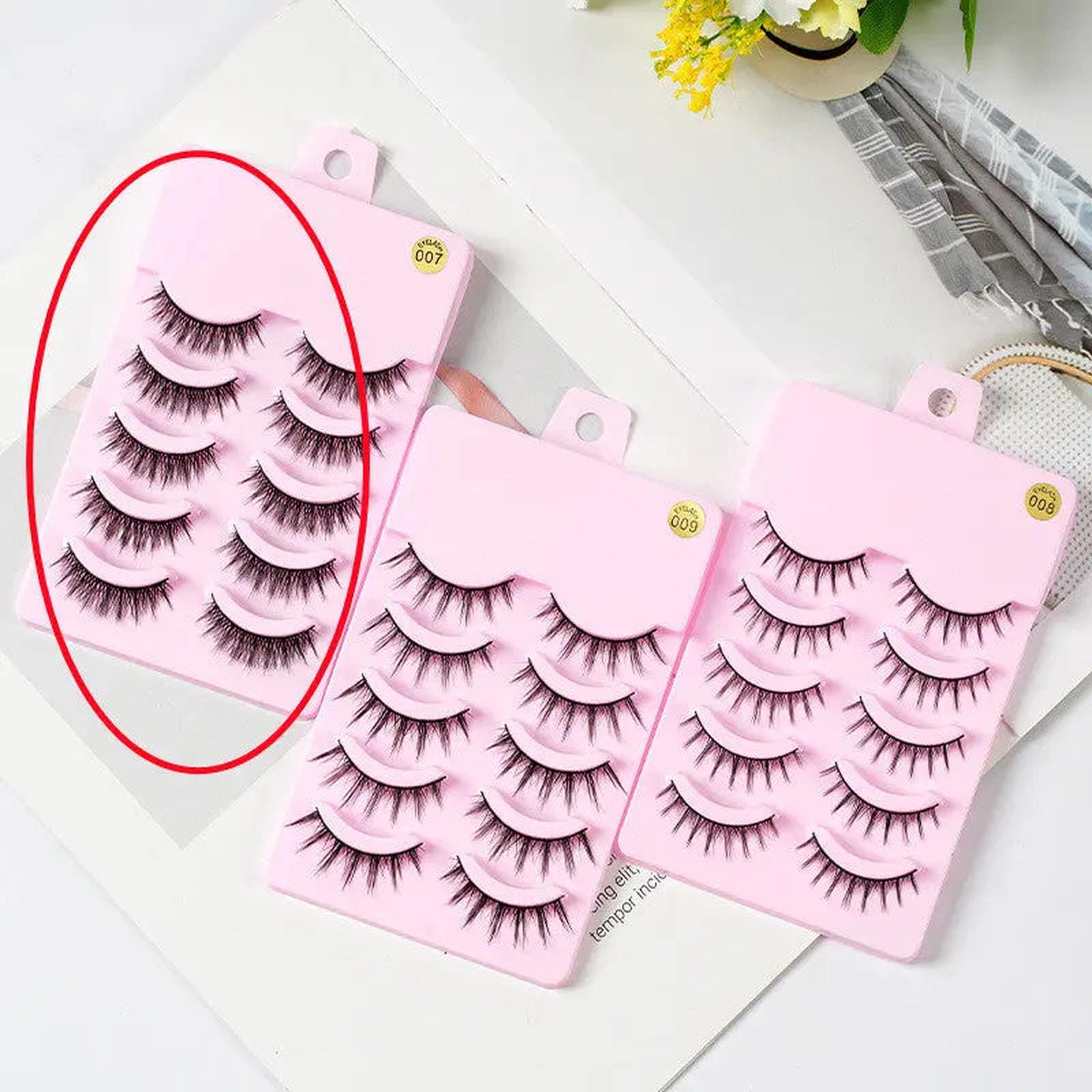 Five pairs of Trendsi Manga Lashes for anime cosplay, featuring natural, wispy false eyelashes for Korean-inspired makeup looks.