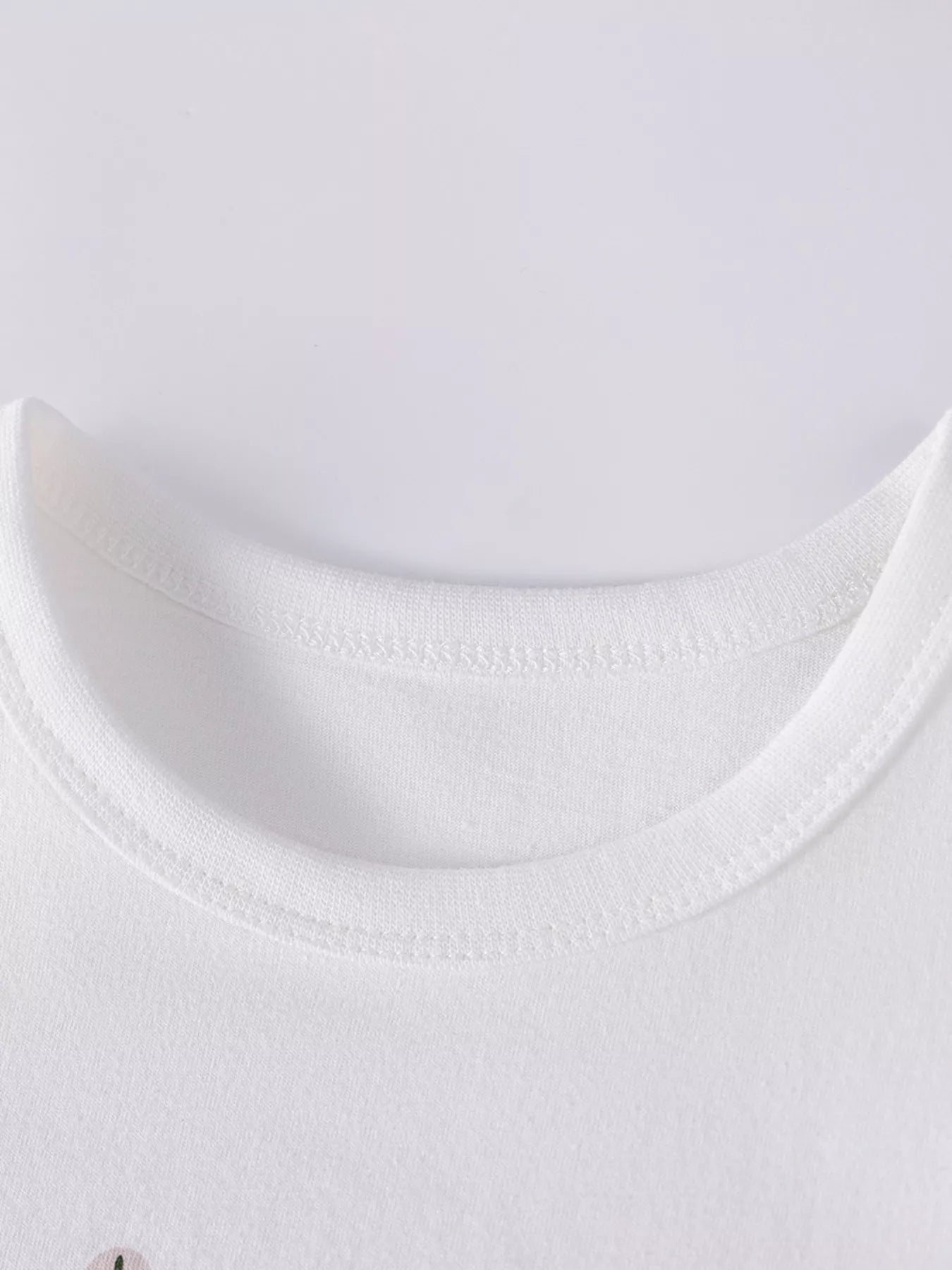 Children's army green graphic T-shirt and shorts set from Trendsi for 2-year-olds, casual and comfortable kids' clothing.