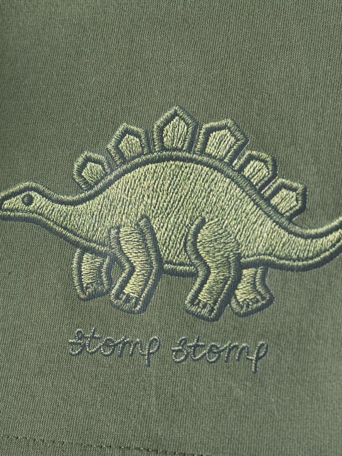 Children's army green graphic T-shirt and shorts set by Trendsi, featuring playful design and comfortable fit for kids.