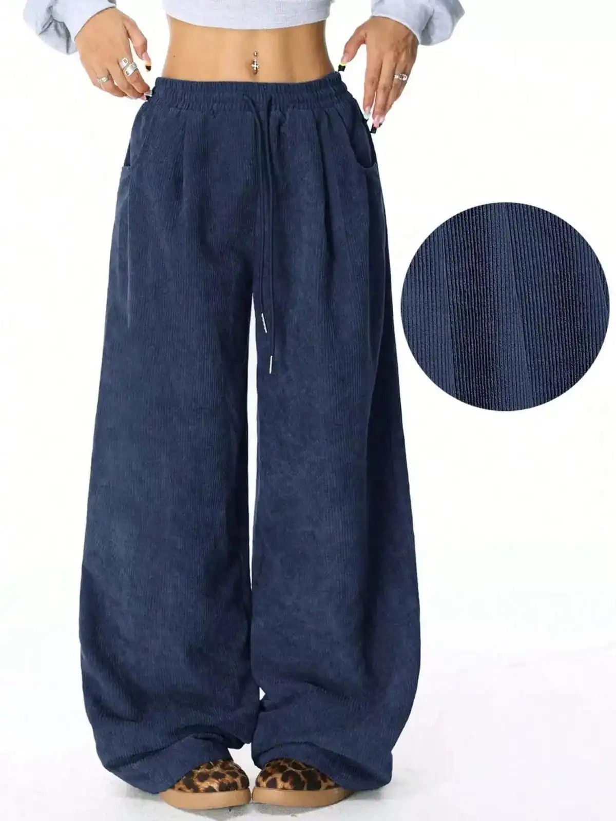 Blue casual corduroy wide-leg pants from Trendsi, featuring a relaxed fit and stylish wide profile for comfortable everyday wear.