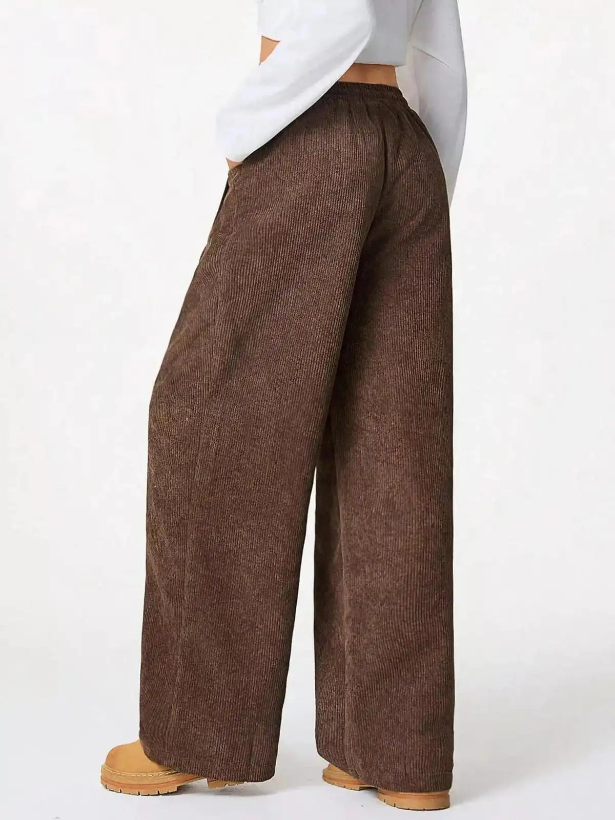 Blue casual corduroy wide-leg pants by Trendsi, shown with relaxed fit and high waist, perfect for everyday style.