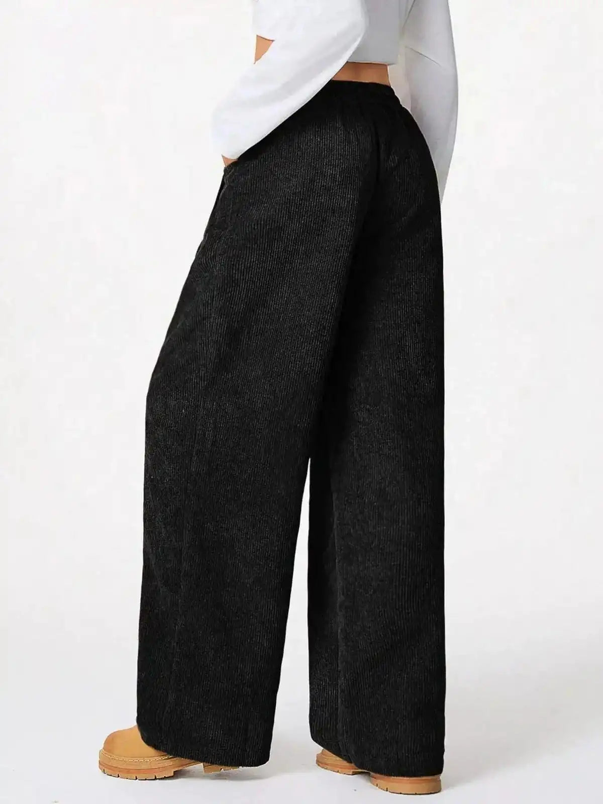 Blue casual corduroy wide-leg pants by Trendsi, featuring a relaxed fit and stylish design, suitable for everyday wear.