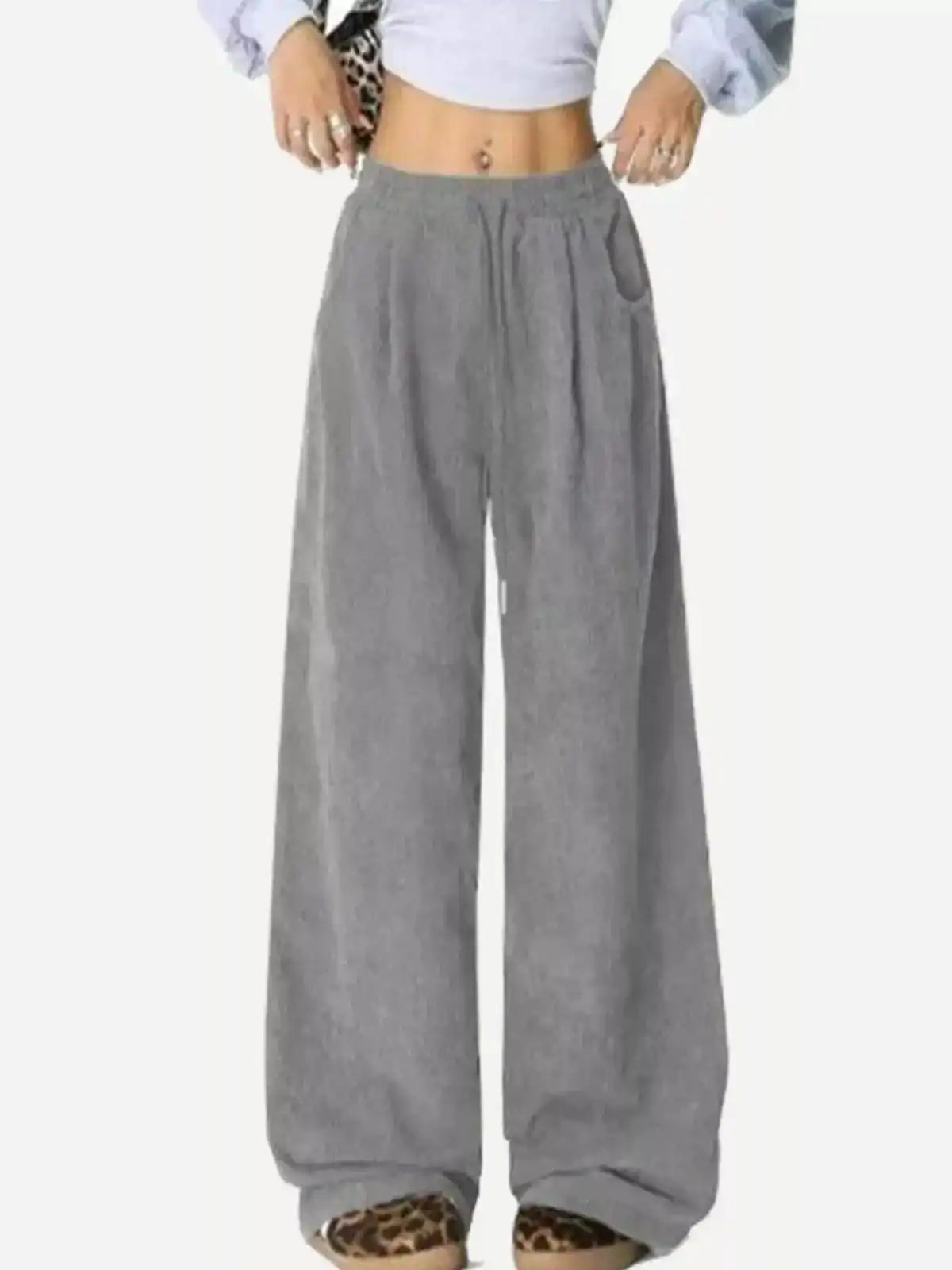 Blue casual corduroy wide leg pants from Trendsi, featuring a relaxed fit and high waist for comfortable everyday wear.