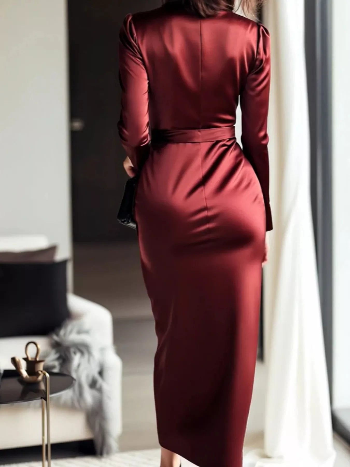 Burgundy satin wrap long sleeve midi dress by Trendsi, featuring a fitted waist and elegant drape, perfect for formal occasions.