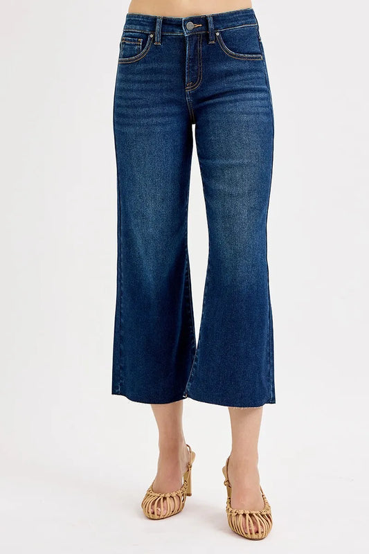 Dark wash Risen plus size high-rise crop wide jeans with tummy control, featuring a full size fit and modern wide-leg style.