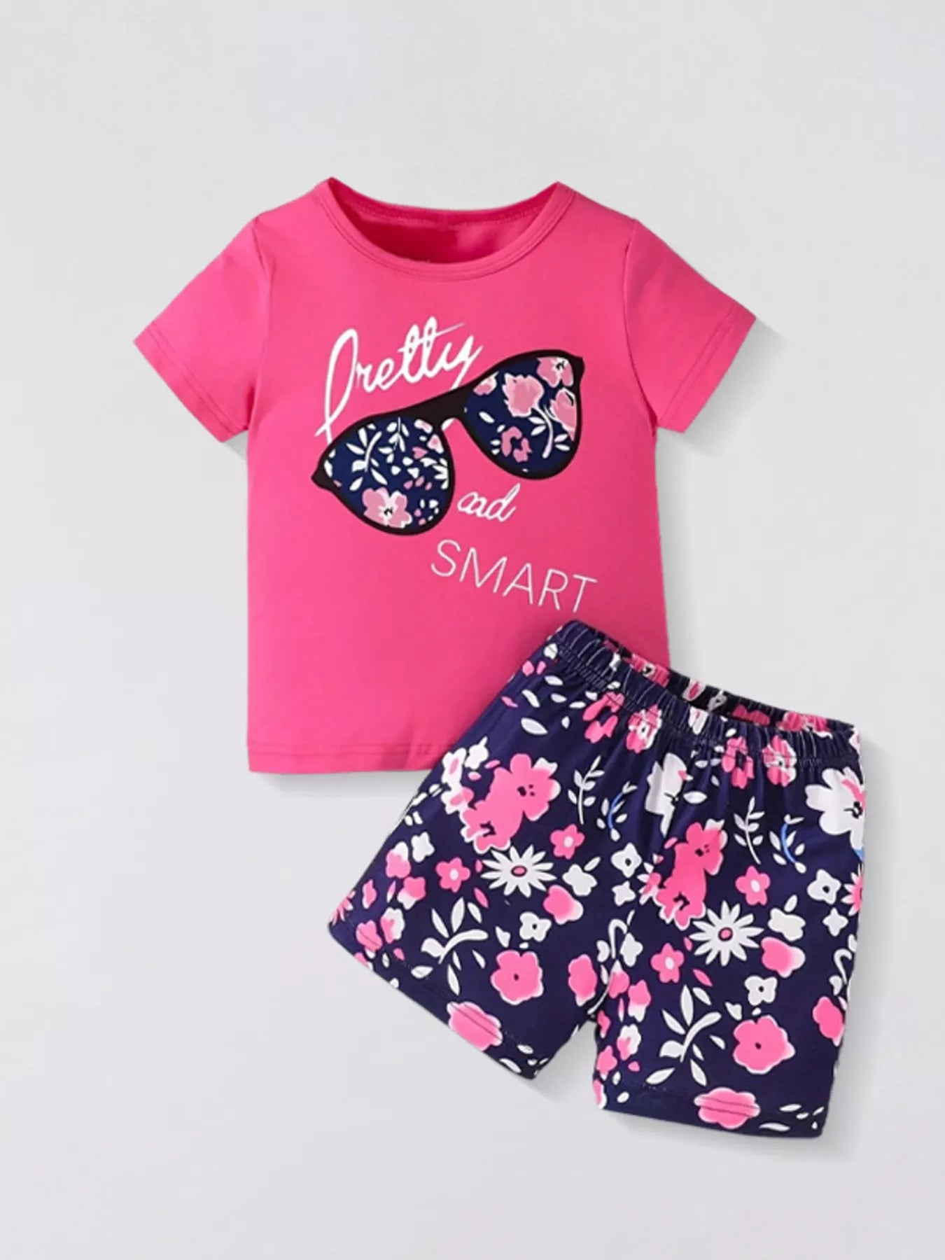Children's floral sunglasses tee and shorts set in hot pink, featuring a fun, colorful floral design for toddlers aged 2-3 years.