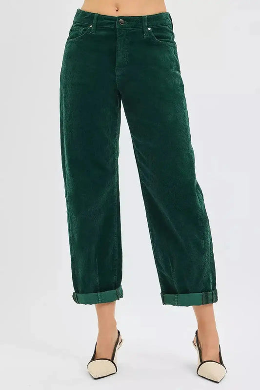 Hunter green Risen high-rise crop barrel corduroy pants from Trendsi, displayed on a hanger with visible texture and stitching.