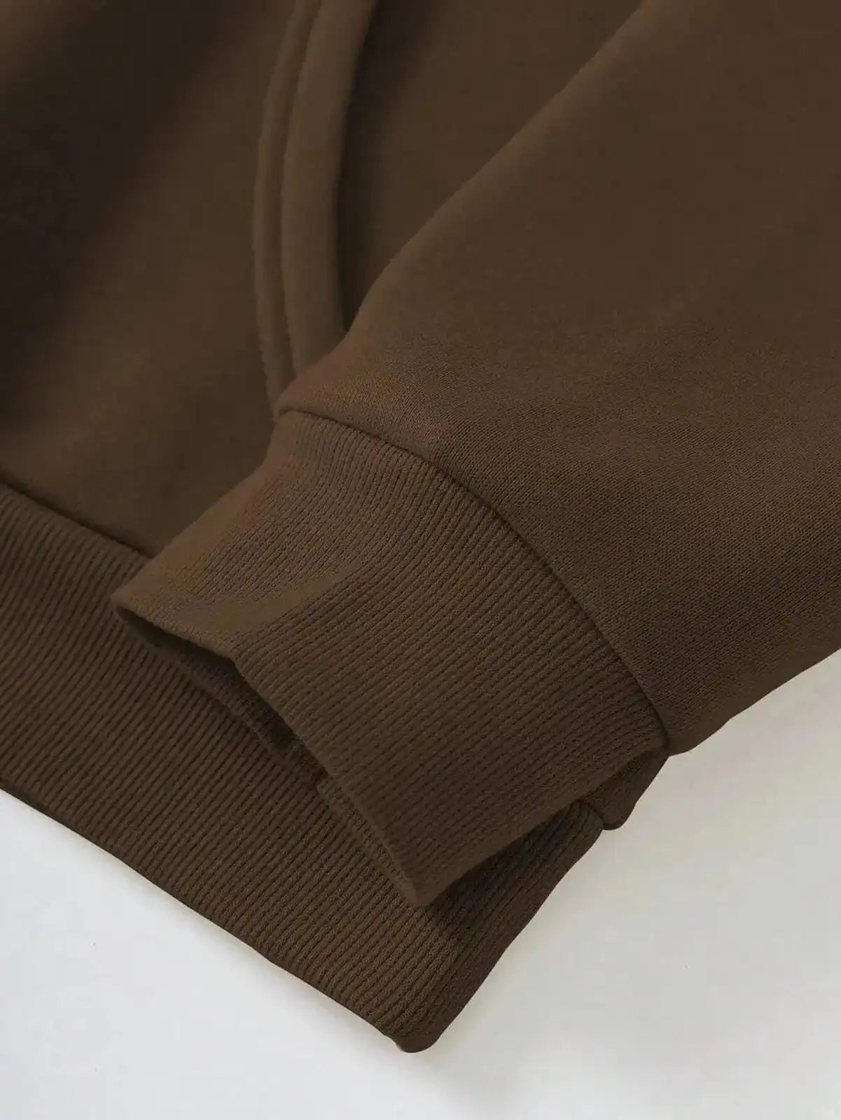 Pink dropped shoulder hoodie with "Faith Over Fear" text, casual style, by Trendsi, featuring a relaxed fit and comfortable fabric.