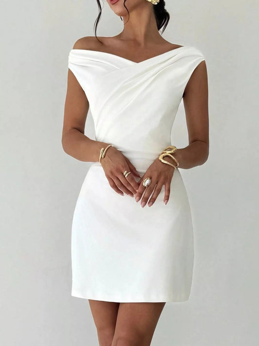 White elegant off-shoulder draped mini dress by Trendsi, showcasing a stylish and sophisticated design with flowing fabric.